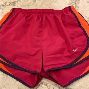 Nike running shorts size small pink and orange